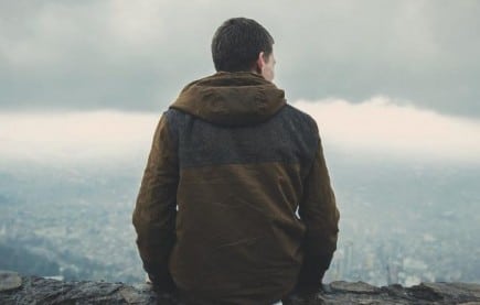 A guy feeling anxious because he has HIV symptoms.