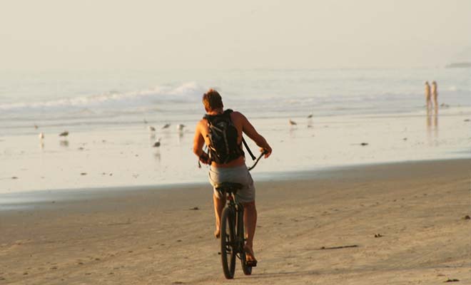 A photo of a gay man on Black's Beach in San Diego.