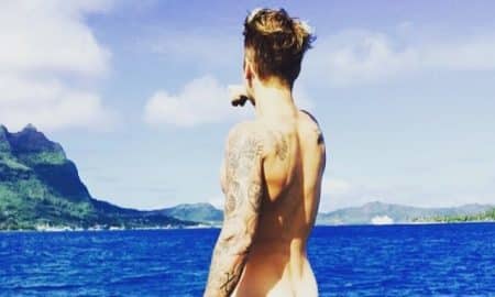 A photo of Justin Bieber with his butt showing.