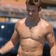 Scott Eastwood took a stroll down the beach. without wearing any underwear.