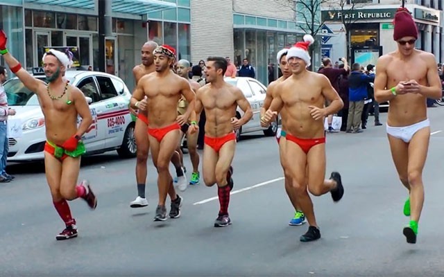 This is a photo of runners participating in the Santa Speedo Run.