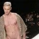 This is a photo of a male model on the runway.