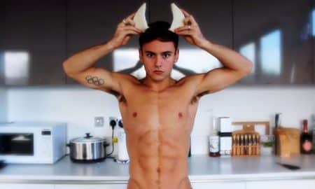 This is a photo of Tom Daley wearing bread horns.