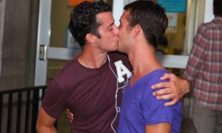 This is a photo of a gay couple kissing.