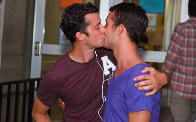 This is a photo of a gay couple kissing.