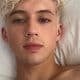 Troye Sivan in bed shirtless
