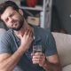 Young man with a sore throat