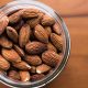A jar full of almonds.