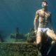A photo of a male model underwater by Lucas Murnaghan