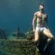 A photo of a male model underwater by Lucas Murnaghan