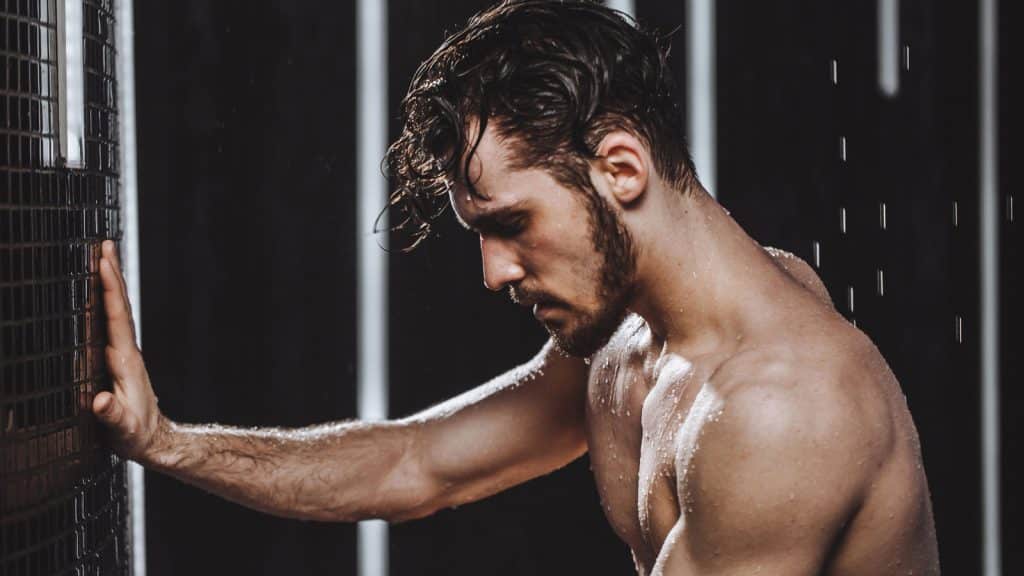 A hunky young man in the shower