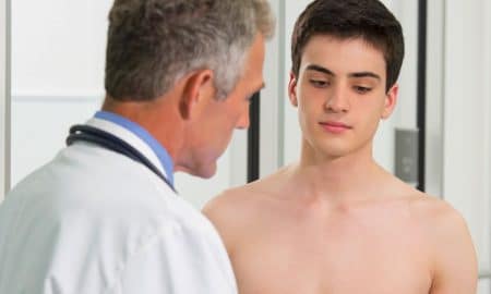 Young man with doctor