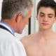 Young man with doctor