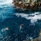 Two men swimming Kauai