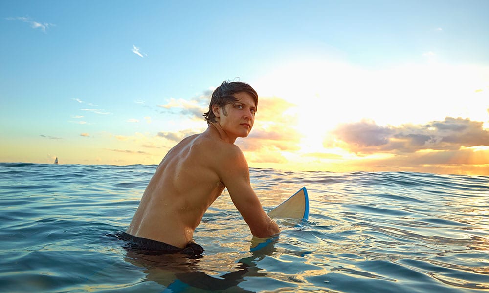Young surfer on Oahu in Hawaii