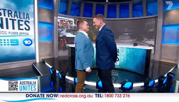 Straight Australian TV Hosts Kiss Live on Air