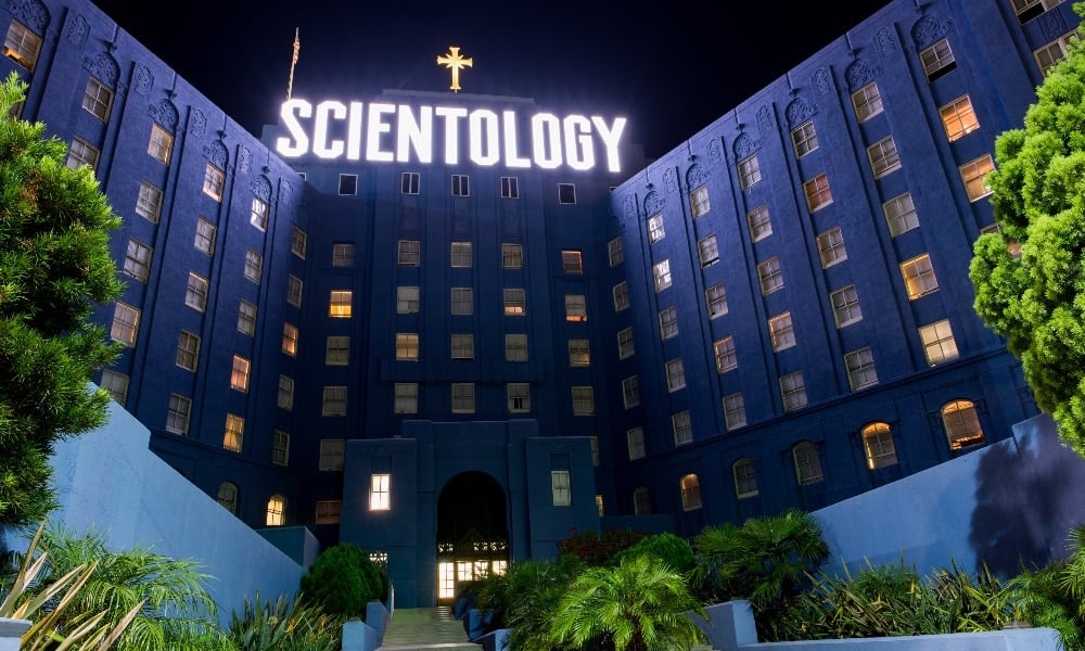 Church of Scientology building at night in Los Angeles. Scientology is a religion that was created in 1954 by science fiction author L. Ron Hubbard.
