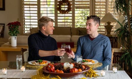 Gay couple eat thanksgiving dinner