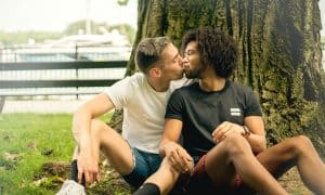 Gay couple kiss in Chicago, IL.