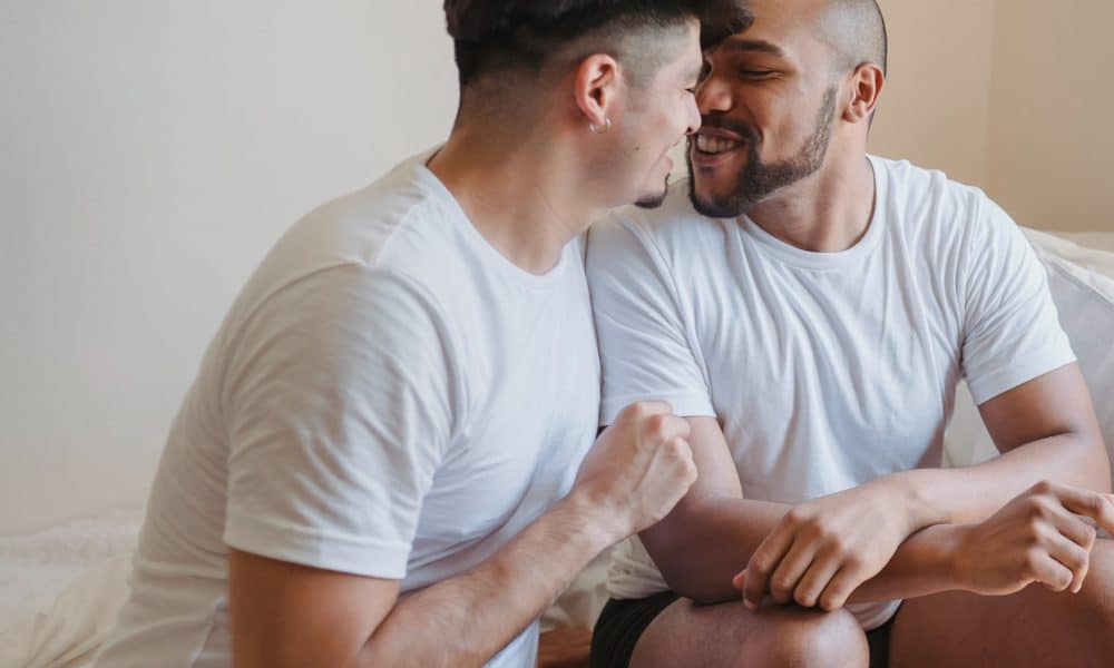 Gay couple kissing