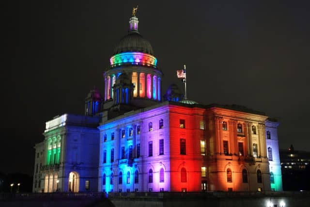 The illuminated Rhode Island State House capitol building in Providence, RI.