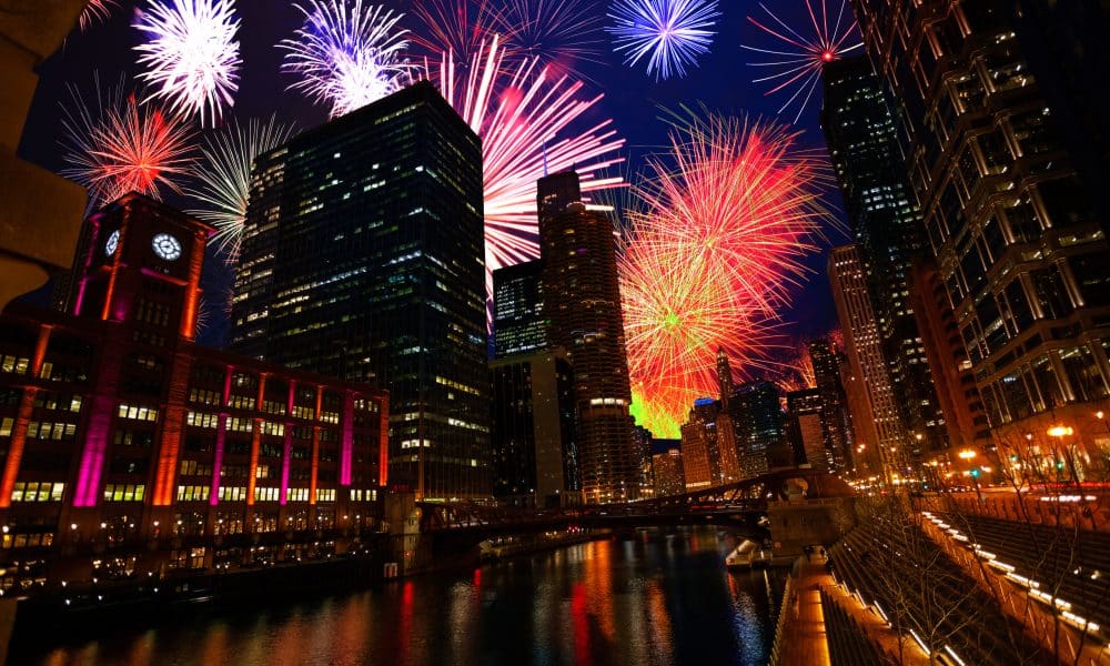 Chicago downtown with fireworks show at night.
