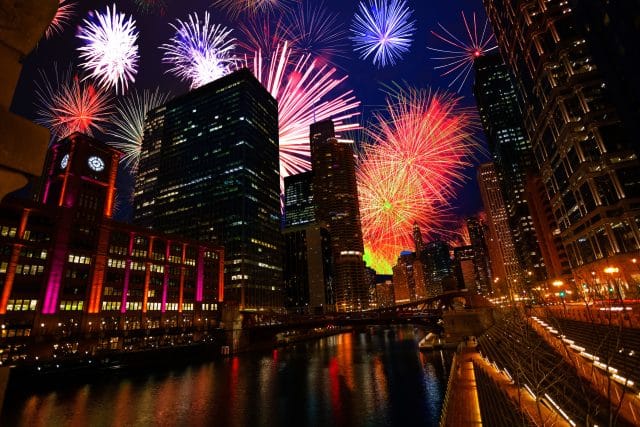 Chicago downtown with fireworks show at night.