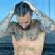 Maluma Flaunts His Toned Physique in Revealing Pool Photos