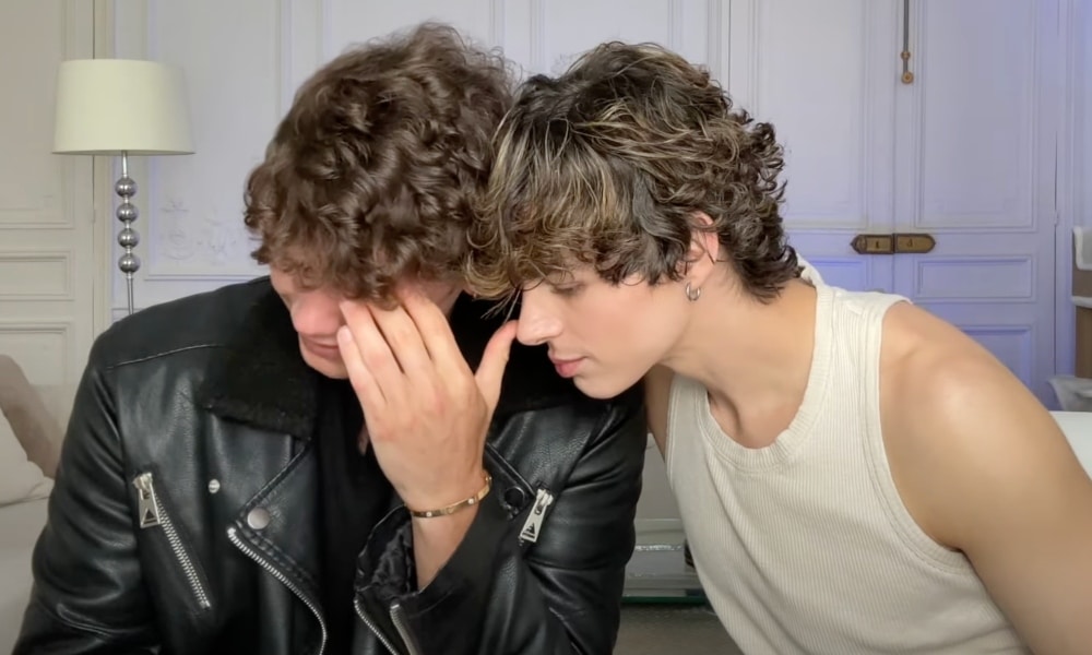 Thumbnail image featuring TikTok stars Nicky Champa and Pierre Boo sitting close together, with Nicky visibly emotional and shedding tears, while Pierre tenderly consoles him.