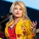 Dolly Parton announces her $1 million donation at a press conference in Newport, Tennessee, to aid Hurricane Helene victims, standing in solidarity with the affected communities.