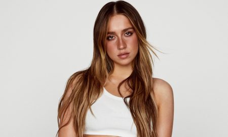 Rising pop star Tate McRae is opening up about her strong bond with her LGBTQ+ fans, admitting they are her "favorite" and sharing that her entire team is LGBTQ+.