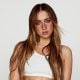 Rising pop star Tate McRae is opening up about her strong bond with her LGBTQ+ fans, admitting they are her "favorite" and sharing that her entire team is LGBTQ+.