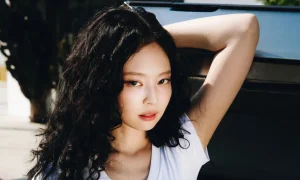 JENNIE is ramping up the excitement for the release of her highly anticipated debut solo album Ruby with the release of a new single, "ExtraL," featuring Grammy winner Doechii.