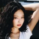 JENNIE is ramping up the excitement for the release of her highly anticipated debut solo album Ruby with the release of a new single, "ExtraL," featuring Grammy winner Doechii.