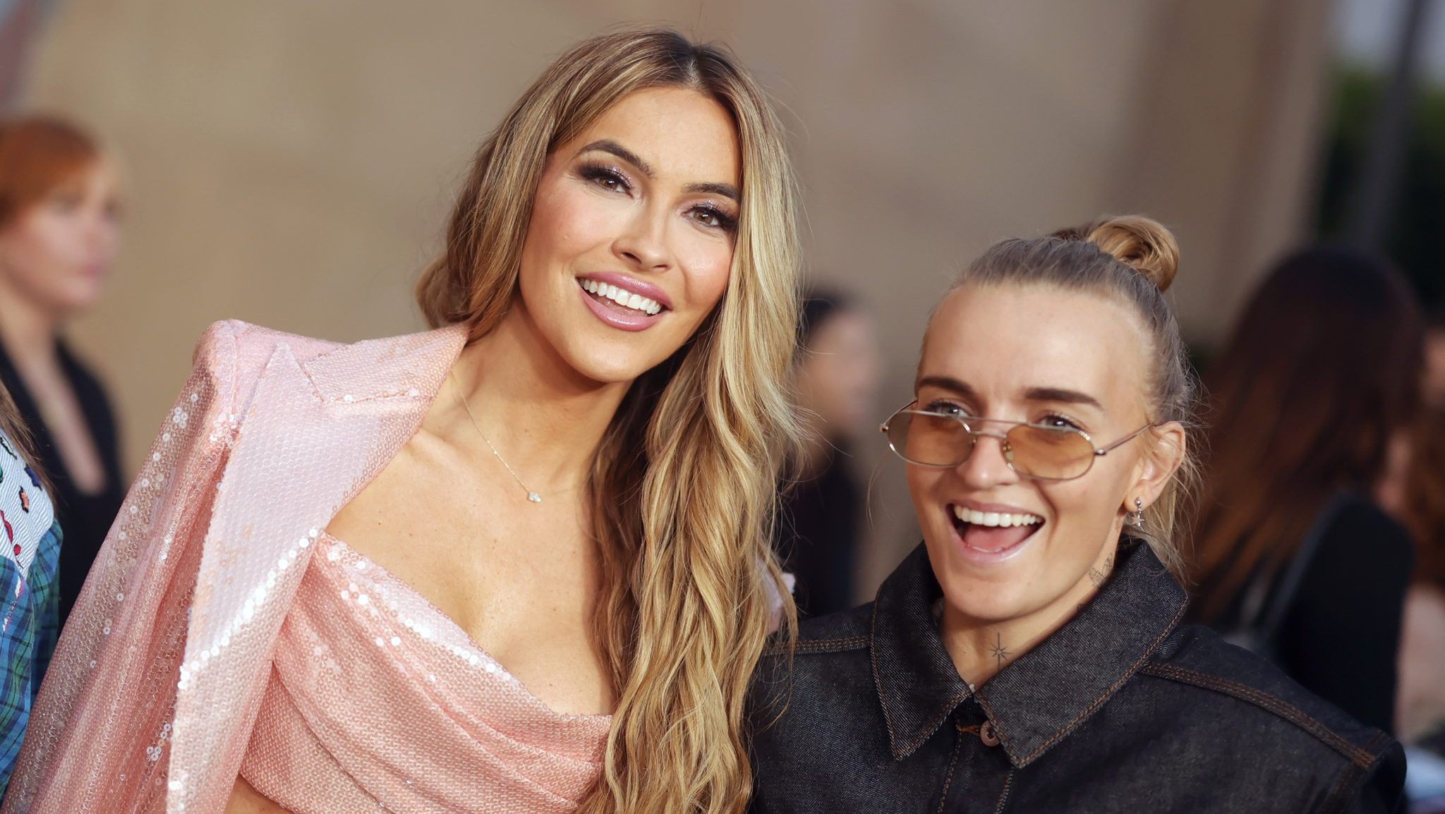 Chrishell Stause and G Flip attend Netflix's "Will and Harper" LA Premiere at The Egyptian Theatre Hollywood on September 19, 2024 in Los Angeles, California.
